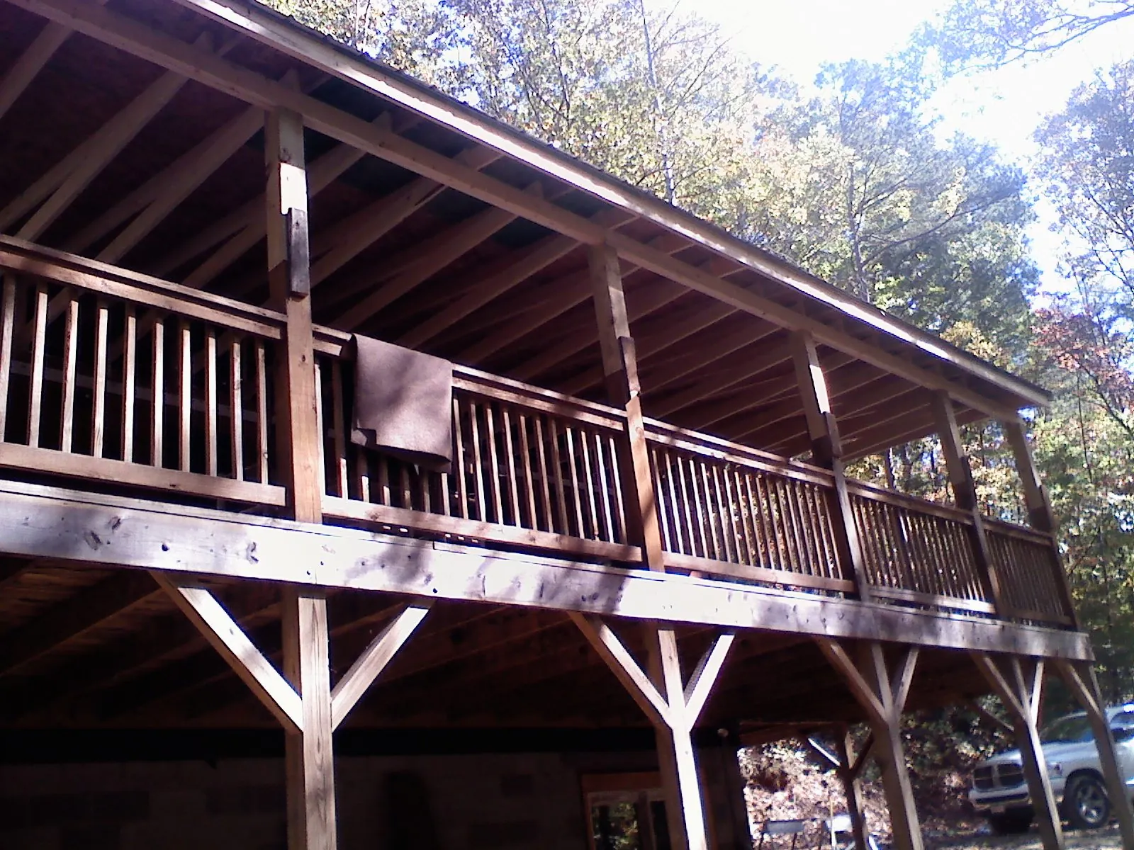 Timber framing under a new elevated porch and deck — Roof Leak Repair in Oquawka by Roofing Brothers